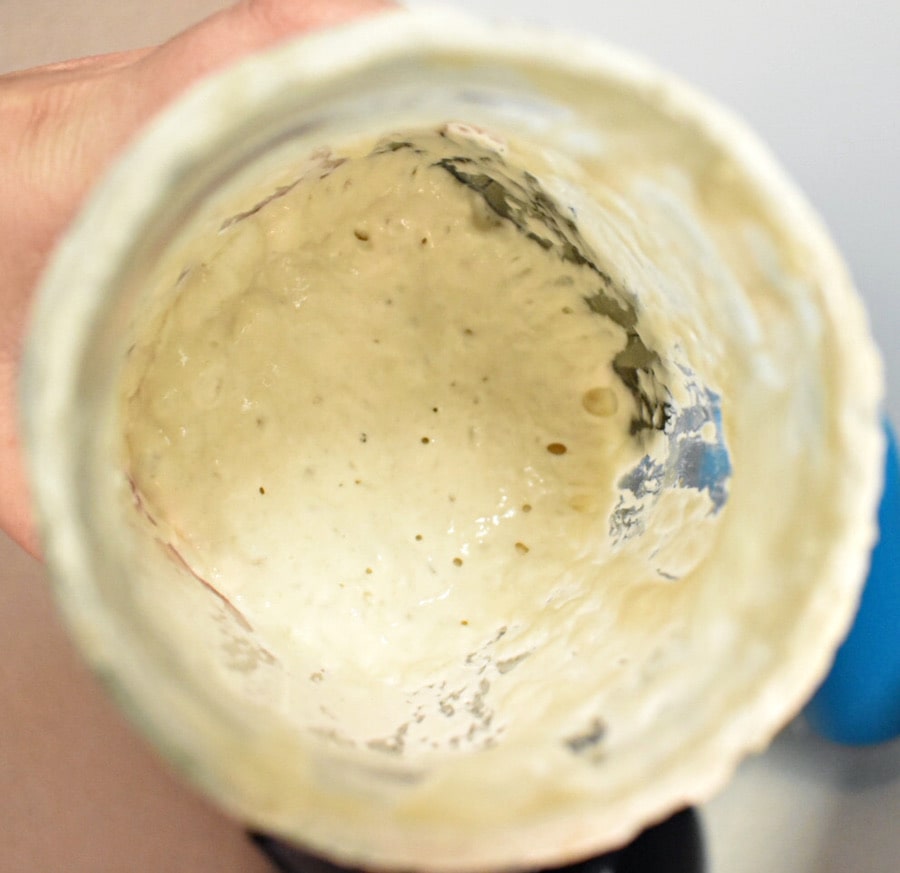 active sourdough starter in a quart mason jar