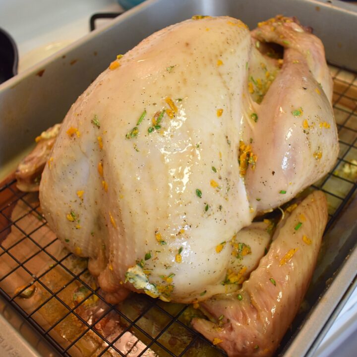 super simple brined turkey with citrus herb butter ready to roast