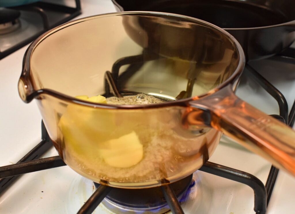 butter melting in a clear sauce pan